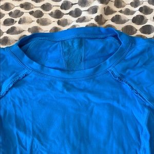 Gently used Lululemon top with lace and ruffles.